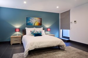 Guest room with blue wall -This guest room became light and bright with new joinery, paint and accessories.