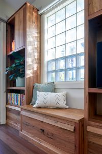 Window seat within bookcase and joinery
